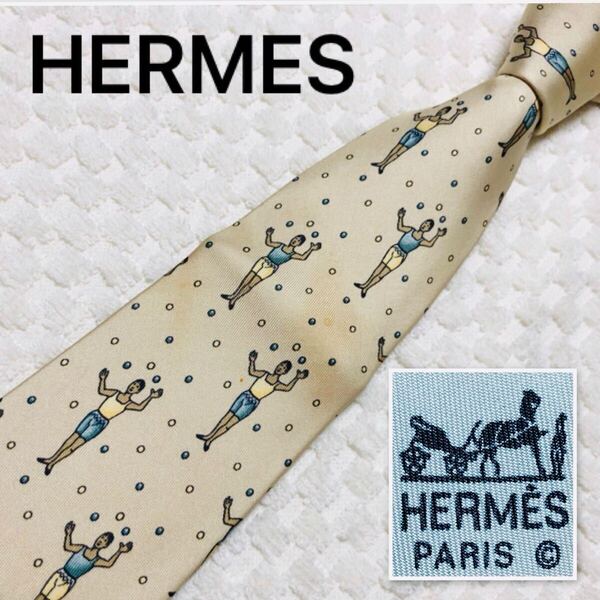 HERMES エルメス ネクタイ 玉投げ スポーツ 総柄 シルク100% フランス製 ライトイエロー系 ビジネス