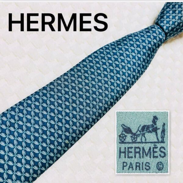■良品■HERMES エルメス ネクタイ 花びら風 総柄 シルク100% フランス製 7064TA 青緑系