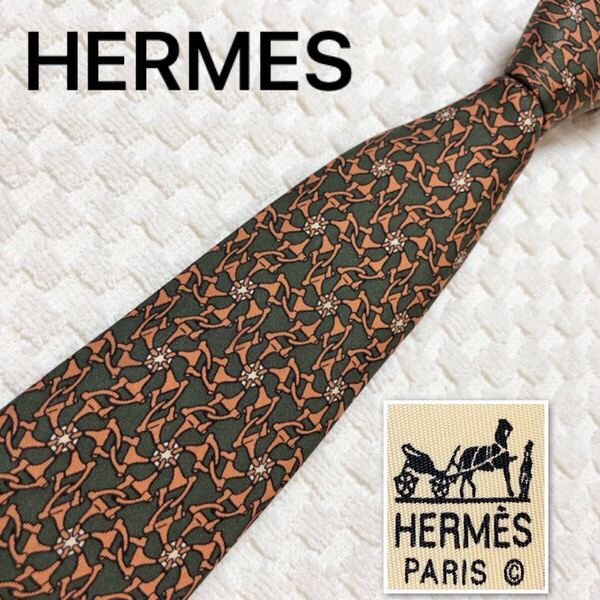 ■美品■HERMES エルメス ネクタイ ホースビット 金具 総柄 シルク100% フランス製 7329 EA ダークグリーン×オレンジ系 ビジネス
