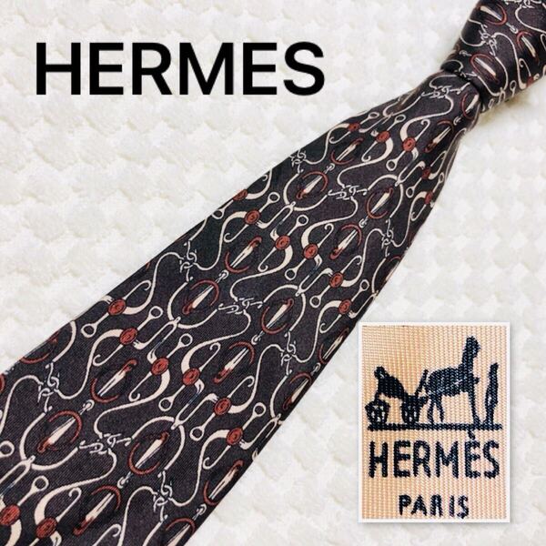 ■美品■HERMES エルメス ネクタイ 金具 総柄 シルク100% フランス製 648 TA ブラウン系 ビジネス