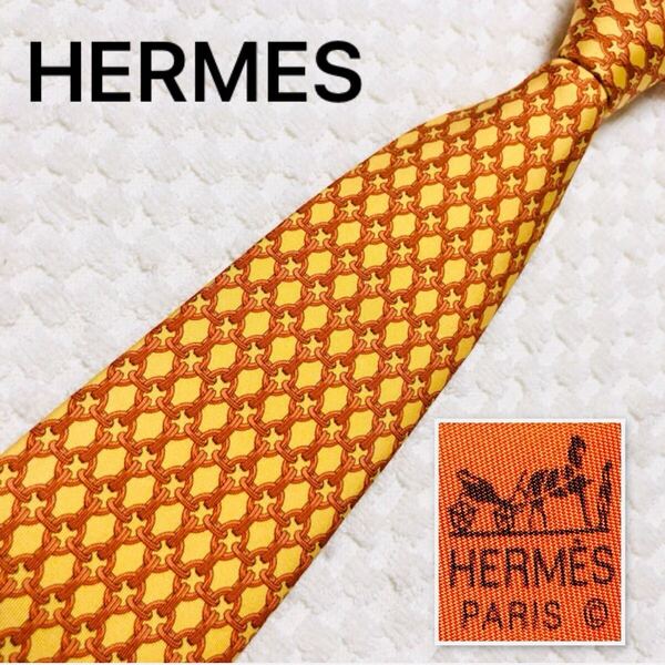 ■美品■HERMES エルメス ネクタイ リングの格子 総柄 シルク100% フランス製 59 EA オレンジ ビジネス