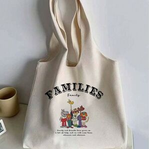 レディース キャンバス トートバッグ ベージュ イラスト 英字プリント 大容量 買い物 通学 通勤 可愛い668780