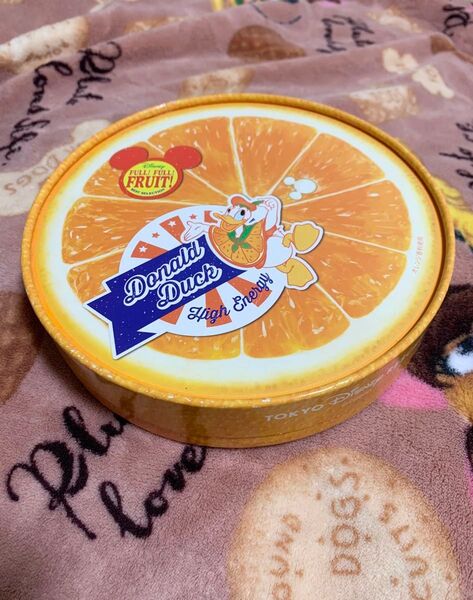 ディズニー お菓子空き箱 ドナルド オレンジ丸型 ディズニーシーディズニーランド