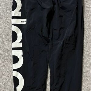 New Balance ナイロンパンツ 黒 メンズ スポーツウェア