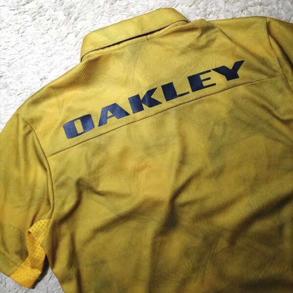 ★OAKLEY オークリー★ゴルフウェア 半袖シャツ 吸汗速乾 総柄 M ポロシャツ レア希少