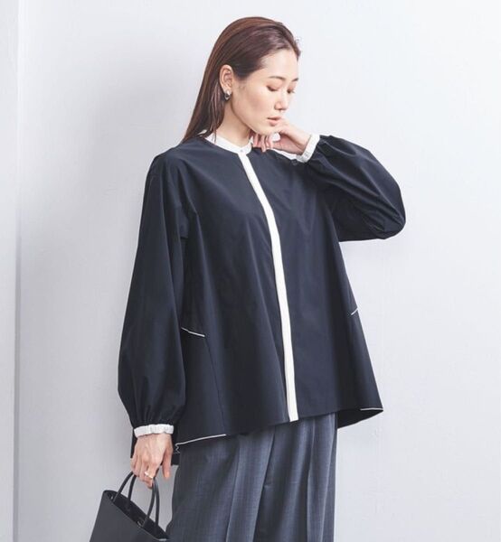 UNITED ARROWSパイピング バック ラッフルフリル ブラウス¥22,000