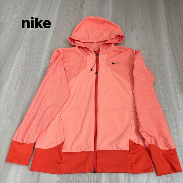 NIKE ウインドブレーカー ジップアップパーカー オレンジ レディース