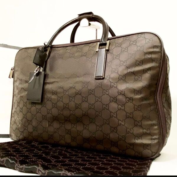 GUCCI グッチ GG柄 トラベルバッグ ボストンバッグ 旅行カバン ブラウン 茶系 パドロック付き 大容量 メンズ レディース