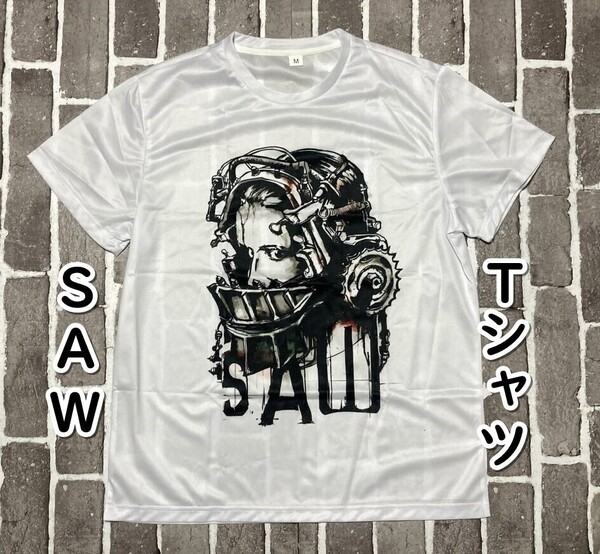 ▲棚:V_H7【Tシャツ ジグソウ(SAW:ソウ トビン・ベル 主演) Mサイズ】sa_wjig S05-25