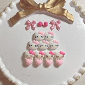 キティちゃん ピンク リボン ハート ネイルパーツ 9個セット(3個パーツおまけ)