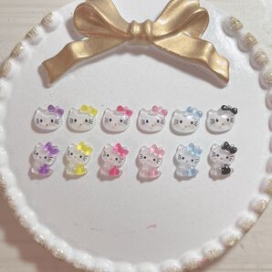 キティちゃん 紫 黄色 ピンク 薄ピンク 水色 黒 ネイルパーツ12個セット