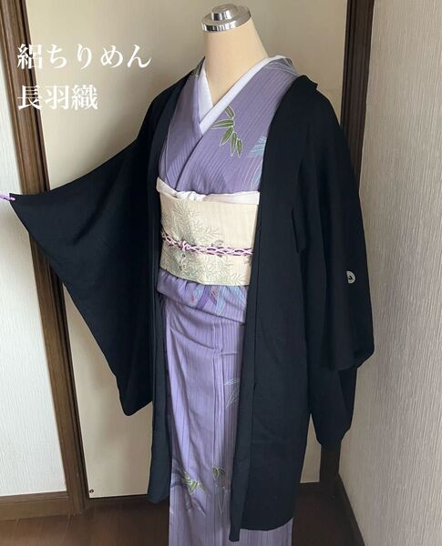 しっとりとした上質な絽ちりめん長羽織 黒地抜き3つ紋 羽織り紐サービス