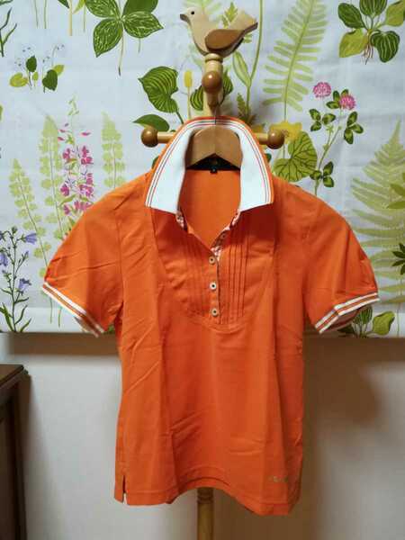 23区 SPORT(ニジュウサンクスポーツ)オレンジ色のポロシャツSサイズ