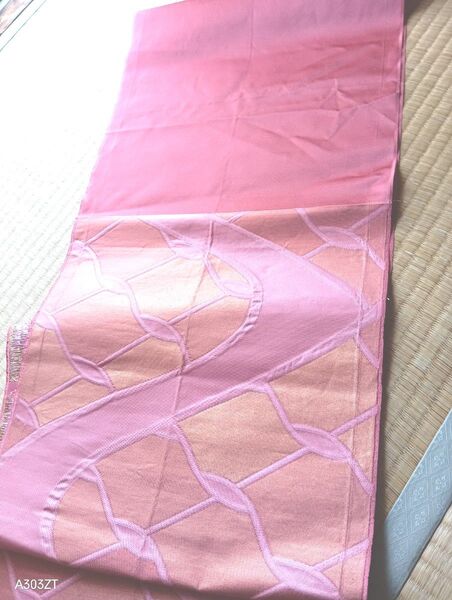 オレンジ色の帯生地 ハギレ 網目模様