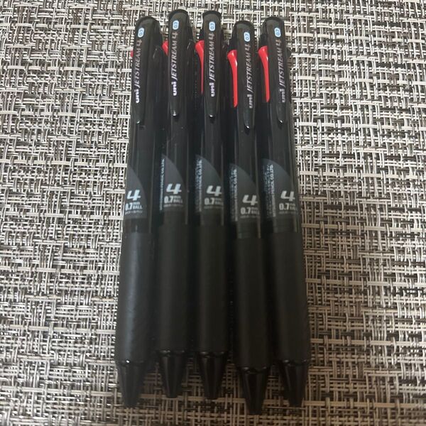 ジェットストリーム 4色ボールペン 透明ブラック(黒・赤・青・緑)0.7mm SXE450007T.24 5本