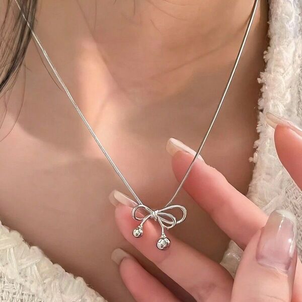 レディース ファッション アクセサリー リボンペンダント ネックレス おしゃれ 可愛いデザイン シルバー310606