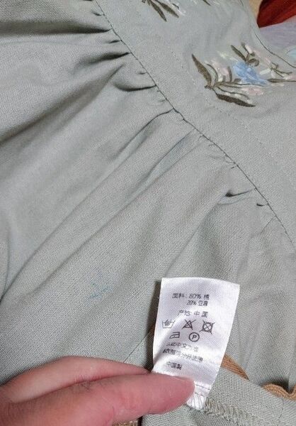 製品タグと袋破損