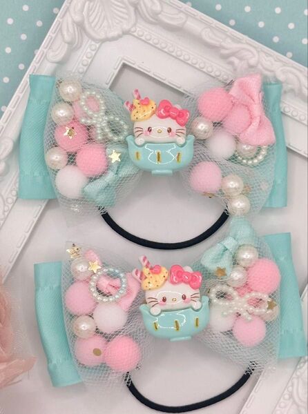 No.80 ハンドメイド ヘアゴム リボン キッズ ベビー ハローキティ シャカシャカリボン パステルグリーン