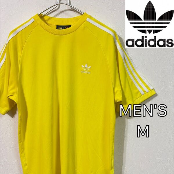 【adidas × PHARRELL WILLIAMS】コラボTシャツ メンズM イエロー アディダス 半袖