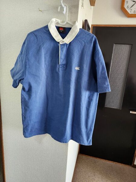 カンタベリーのブルーのラガーシャツです。わりとふわりとした品物XLです。縁は、真っ白で綺麗です。
