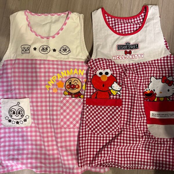 アンパンマン キティーちゃん エルモ バイキンマン ドキンちゃん 赤 ピンク エプロン