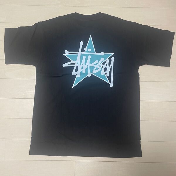 新品 STUSSYデザイングラフィックTee スター Tシャツ L