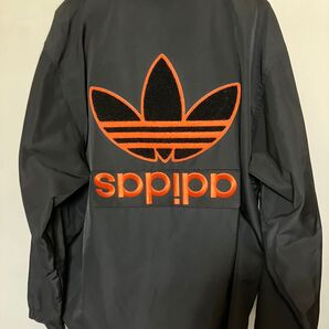 adidas originalコーチジャケット バックプリント プライムグリーン