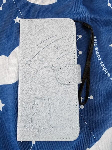 arrows NX9 F-52A スマホケース 手帳型 猫 星 水色 ブルー