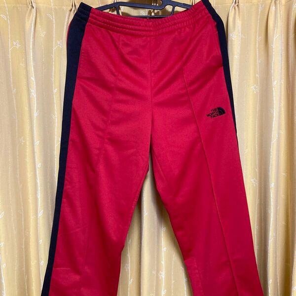 アウトドアブランドのジャージ ノースフェイス ザ トラックパンツ The Track Pant メンズ Sサイズ TNFレッド