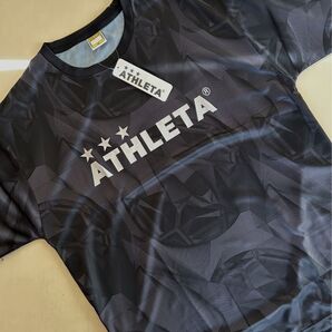 新品タグ付き メンズXO ATHLETAアスレタ 総柄プラTシャツ ブラック