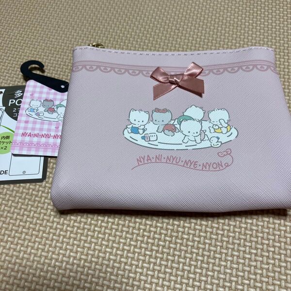 ニャニィニュニェニョン サンリオ Sanrio 二つ折り 多機能収納ポーチ 新品