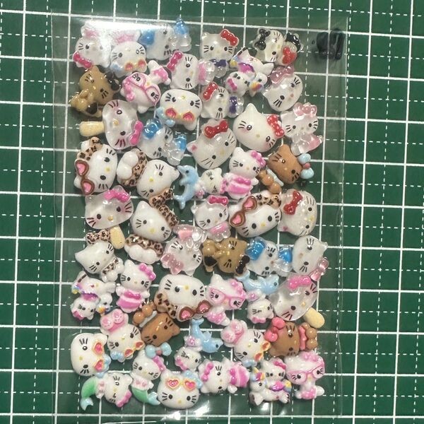 87.ネイルパーツ デコパーツ 約50個 キティ