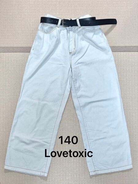 Lovetoxic ラブトキシック 合皮ベルトつき タックワイドパンツ オフホワイト 140