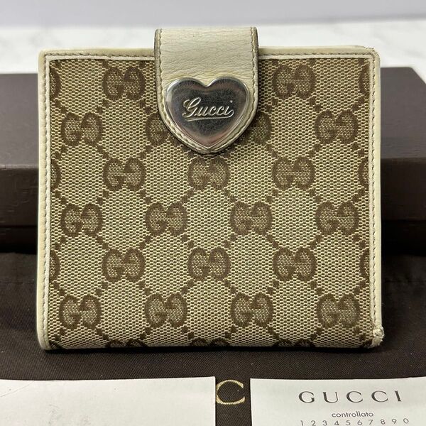 新品同様! グッチ GUCCI 財布 二つ折り 折り財布 GGキャンバス ハート金具