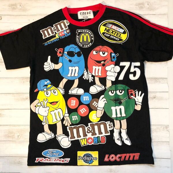 エム&エムズ m&m's L プリントTシャツ ブラック .