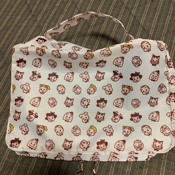 新品 オサムグッズ 靴下屋コラボ メッシュケース osamu goods 収納袋 フェイス総柄 ポーチ 持ち手付き