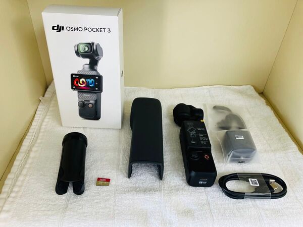 DJI OSMO POCKET3本体とMicroSDとミニ三脚 カメラレンズにはガラスフィルム貼ってあります