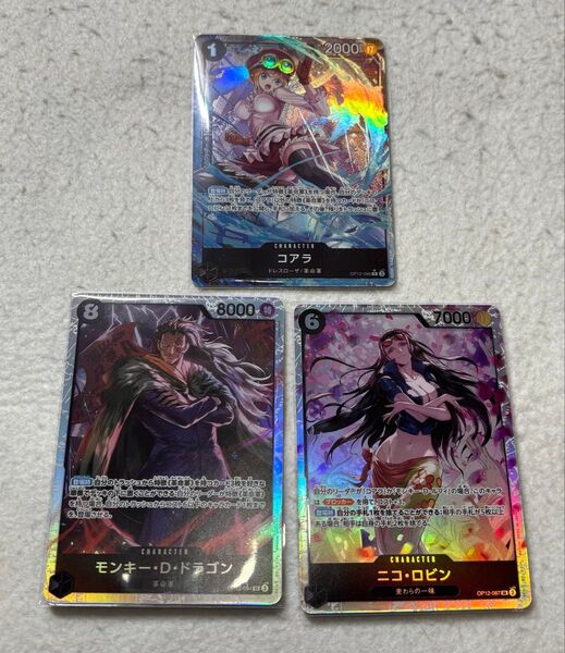 ワンピースカード コアラ Rパラレル SR モンキーDドラゴン、ニコロビン 師弟の絆