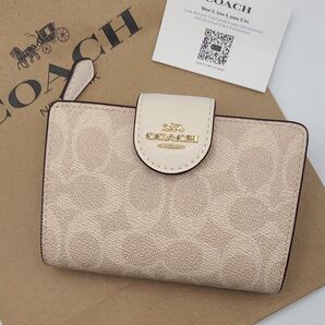 新品 COACH 折り財布 ジップウォレット シグネチャー