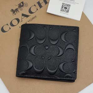 新品 COACH 折り財布 シグネチャー