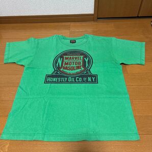 ザ リアルマッコイズ 24karats MARVEL HONESTLY OIL Tシャツ