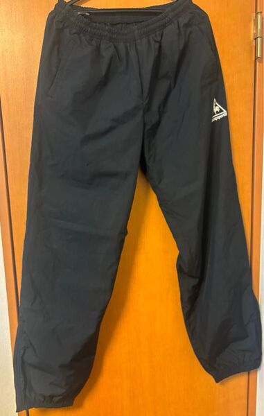 le coq sportif パンツ ブラック スポーツパンツ 古着 XOサイズ相当 メンズ 黒