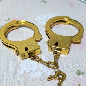手錠、金色、プラスチィック