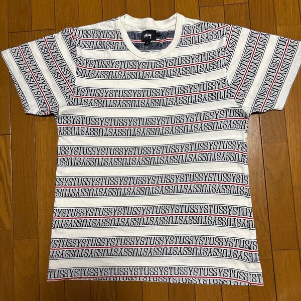 STUSSY ロゴ総柄Tシャツ