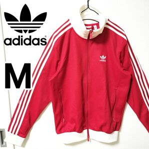 アディダス 赤 ベッケンバウアー トラックジャケット 男性M ジャージ上着 人気 adidas トラックトップ メンズ
