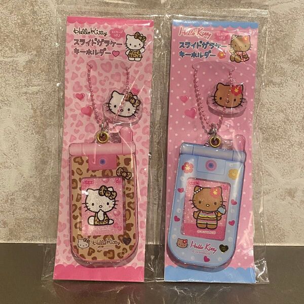 ハローキティ 日焼けキティ ヒョウ柄 スライドガラケー キーホルダー 新品 サンリオ 景品 プライズ 折りたたみ携帯