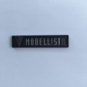 モデリスタ フロントスポイラー エンブレム MODELLISTA