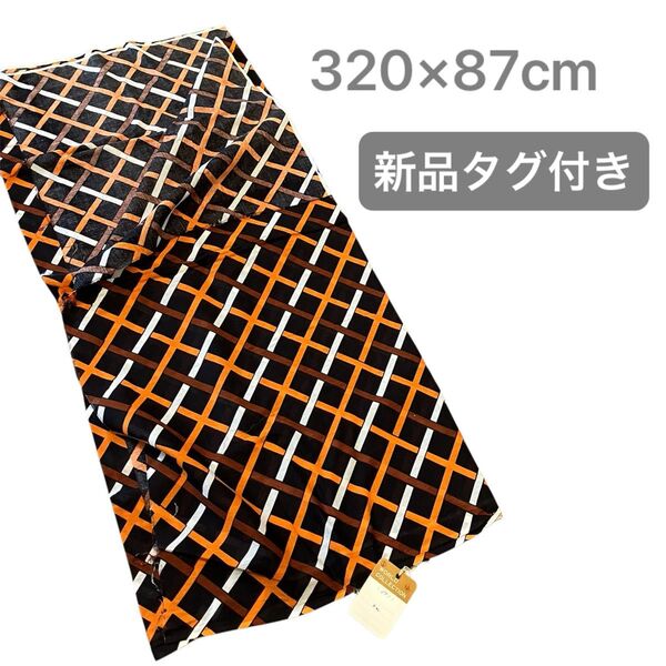 【新品タグ付き】【アフリカンバティック風布地】個性的な格子柄 ブラック×オレンジ×ホワイト
