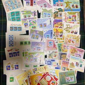 コレクションしていたお年玉切手 11794円分 折り目、黄ばみあり
