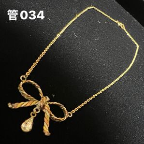 管034 アンティーク風リボン型ペンダントのネックレス 内径約35cm